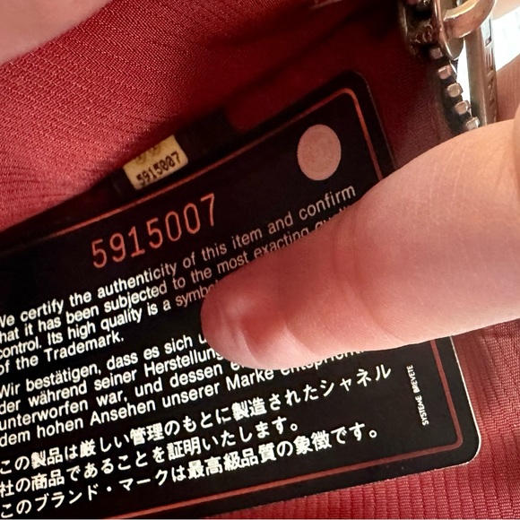 CHANEL black nylon pouch crossbody with chain, bag charm and authenticit⦠- Picture 9 of 12